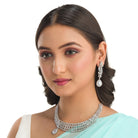 1. "Zircon necklace with a large drop stone adds dramatic sparkle to any look."
