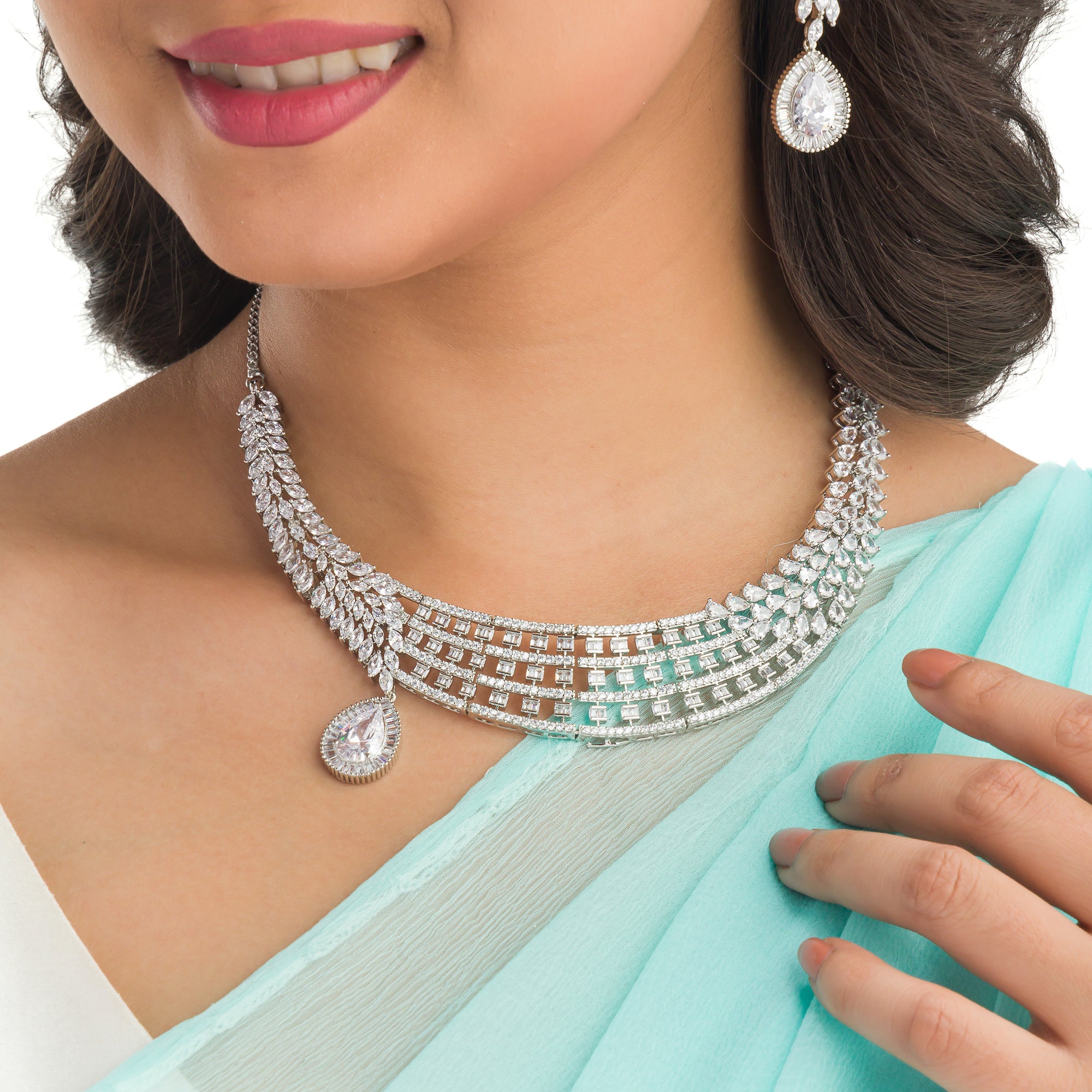 1. "Zircon necklace with a large drop stone adds dramatic sparkle to any look."
