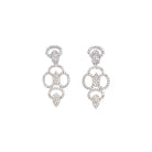 "Zircon necklace with large stone drop adds dramatic sparkle and elegance."
