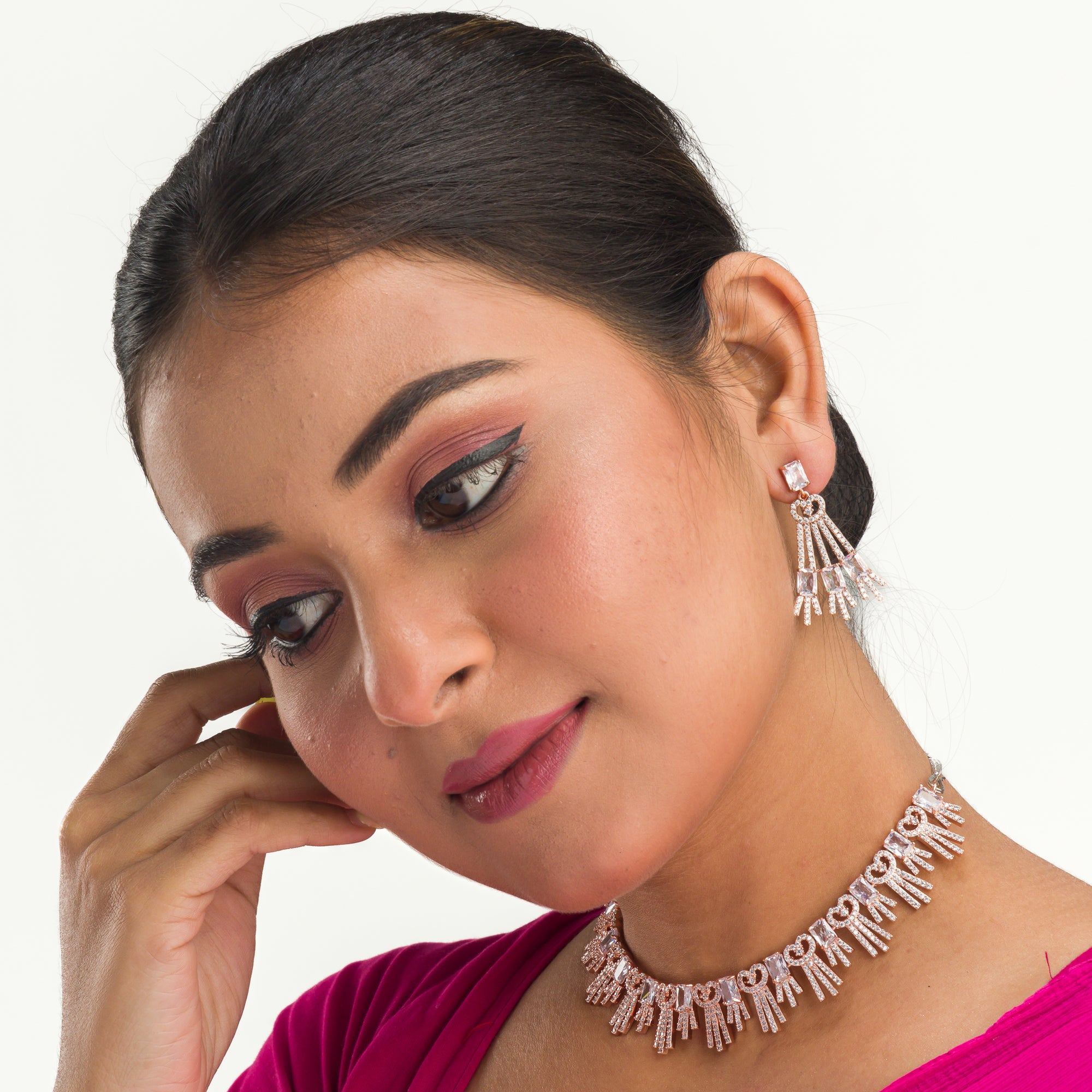 "Elegant rose gold zircon necklace exudes sophistication with timeless sparkle."
