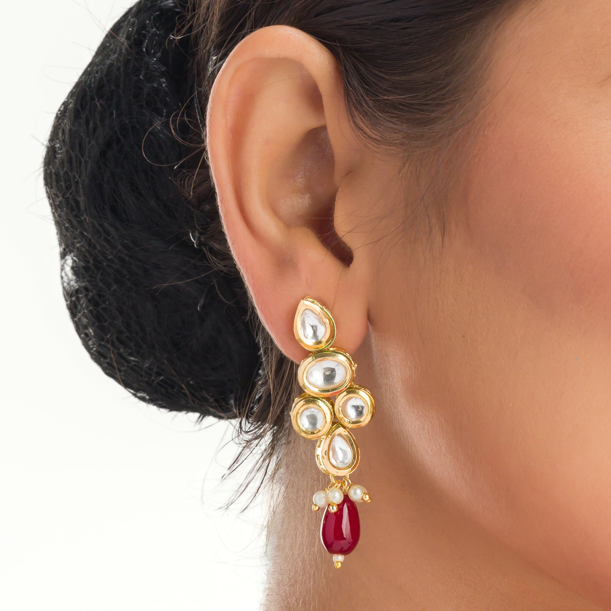Elegant multicolor Kundan necklace with green and maroon stones for a regal, sophisticated party look.
