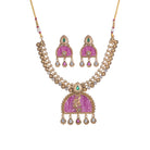 Elegant pink gold-tone short necklace exudes understated charm for a graceful festival look.
