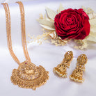 Long temple necklace showcases detailed artistry, perfect for a regal festive look.
