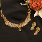 Temple necklace with intricate craftsmanship adds timeless elegance to your festive ensemble.
