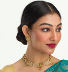 Temple necklace with intricate craftsmanship adds timeless elegance to your festive ensemble.
