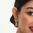 Temple necklace with intricate craftsmanship adds timeless elegance to your festive ensemble.
