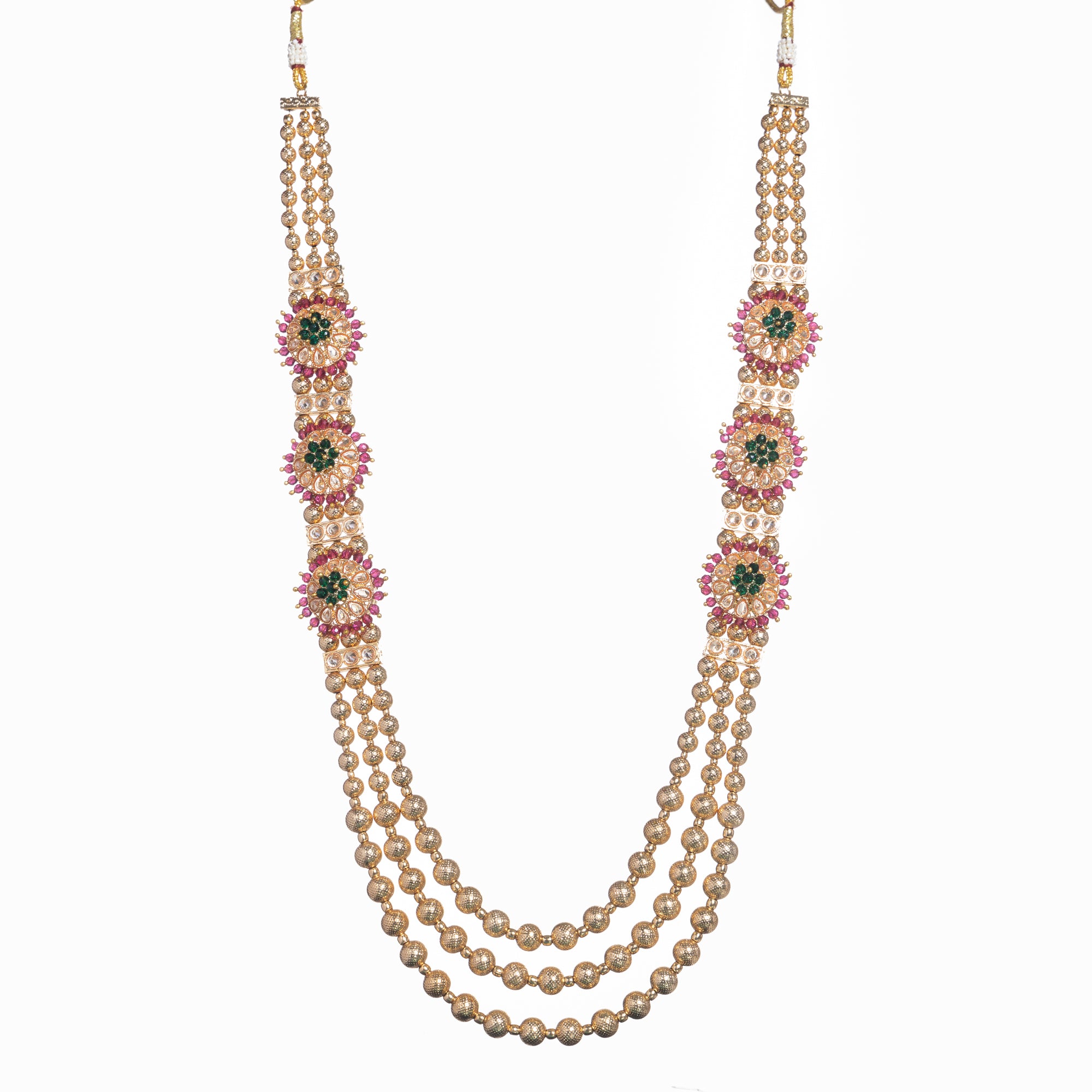Kundan choker with maroon and green stones offers a regal and vibrant festival look.
