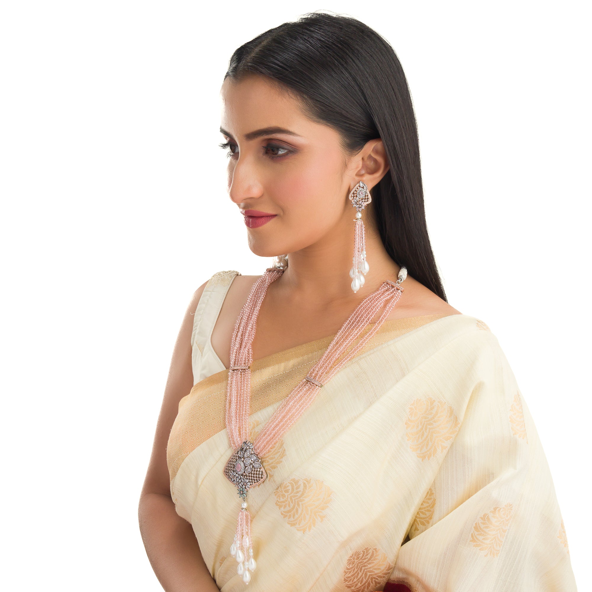 A short necklace with vibrant multi-colour stones brings playful flair to festive attire.
