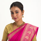 Gold long necklace with multi-color stones exudes vibrant elegance for a festive celebration.
