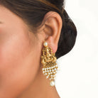 Luxurious temple long necklace with white pearls radiates opulence and refined elegance for festivals.
