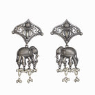 "Oxidized long necklace with umbrella, elephant motifs, and white pearls exudes vintage elegance."
