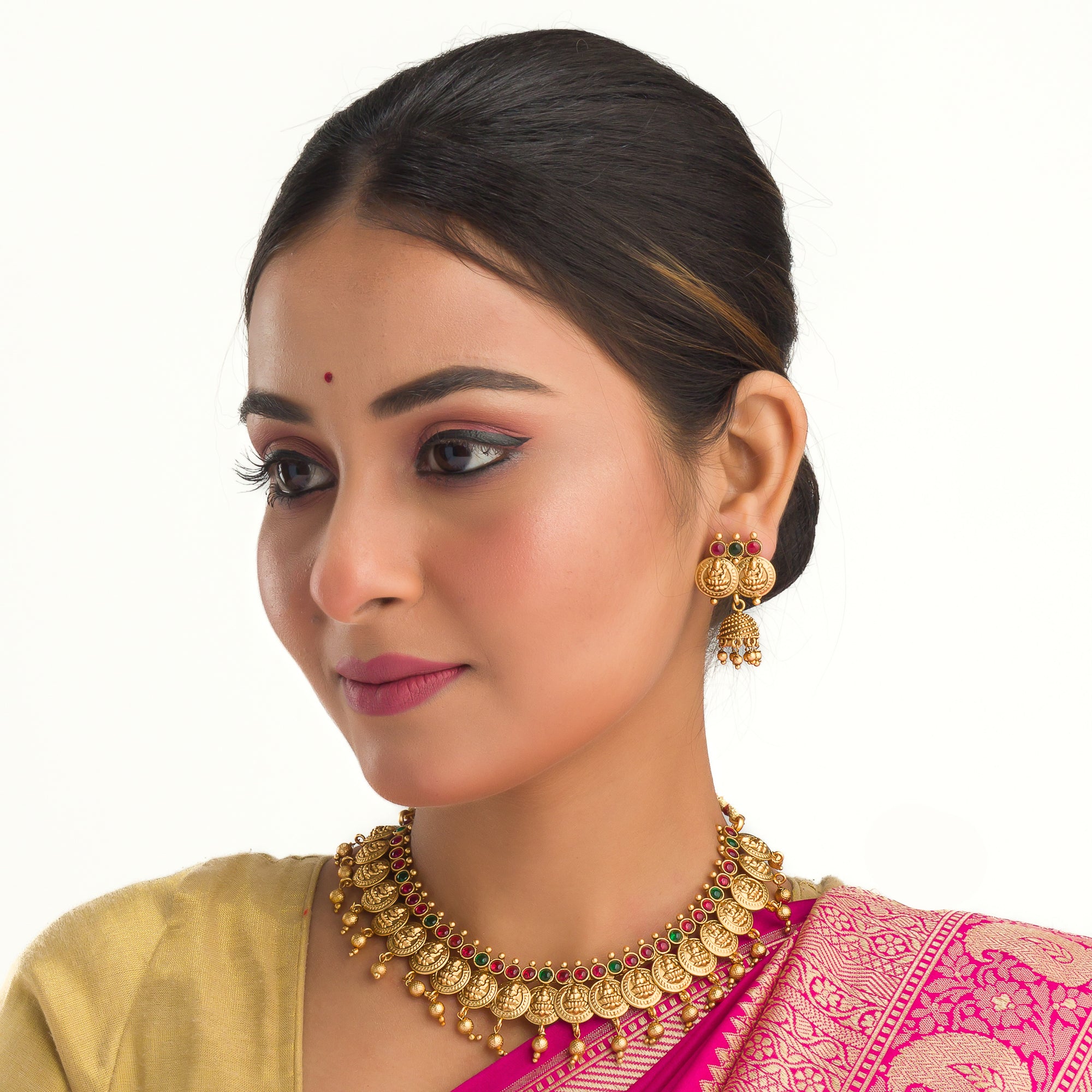 Coin-style gold-tone temple necklace exudes classic elegance and timeless tradition.
