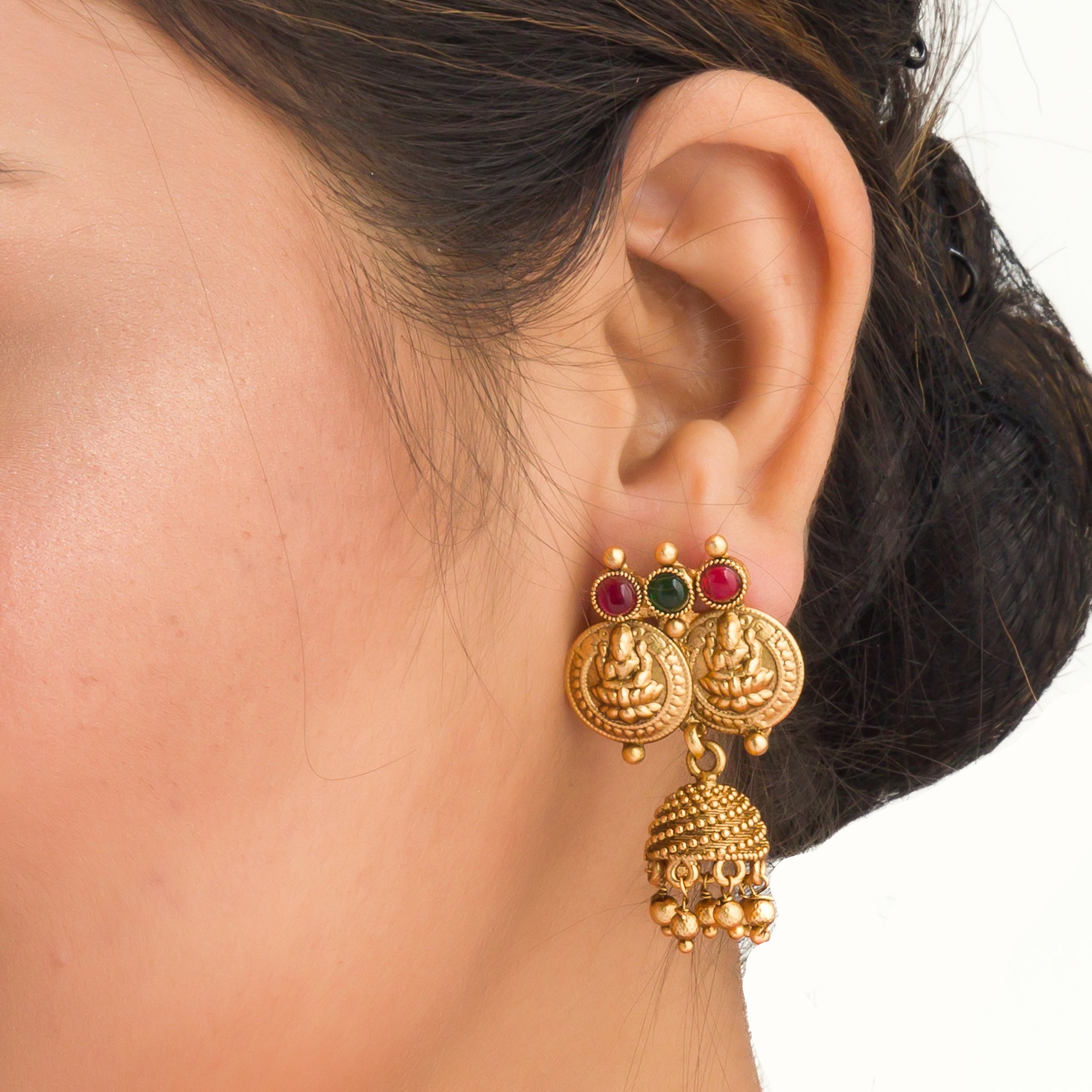 Coin-style gold-tone temple necklace exudes classic elegance and timeless tradition.

