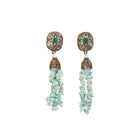 "Gold-tone long necklace with green sea stone offers a refreshing, natural touch."
