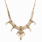"Gold-tone necklace set with white pearls for a classic and elegant look."
