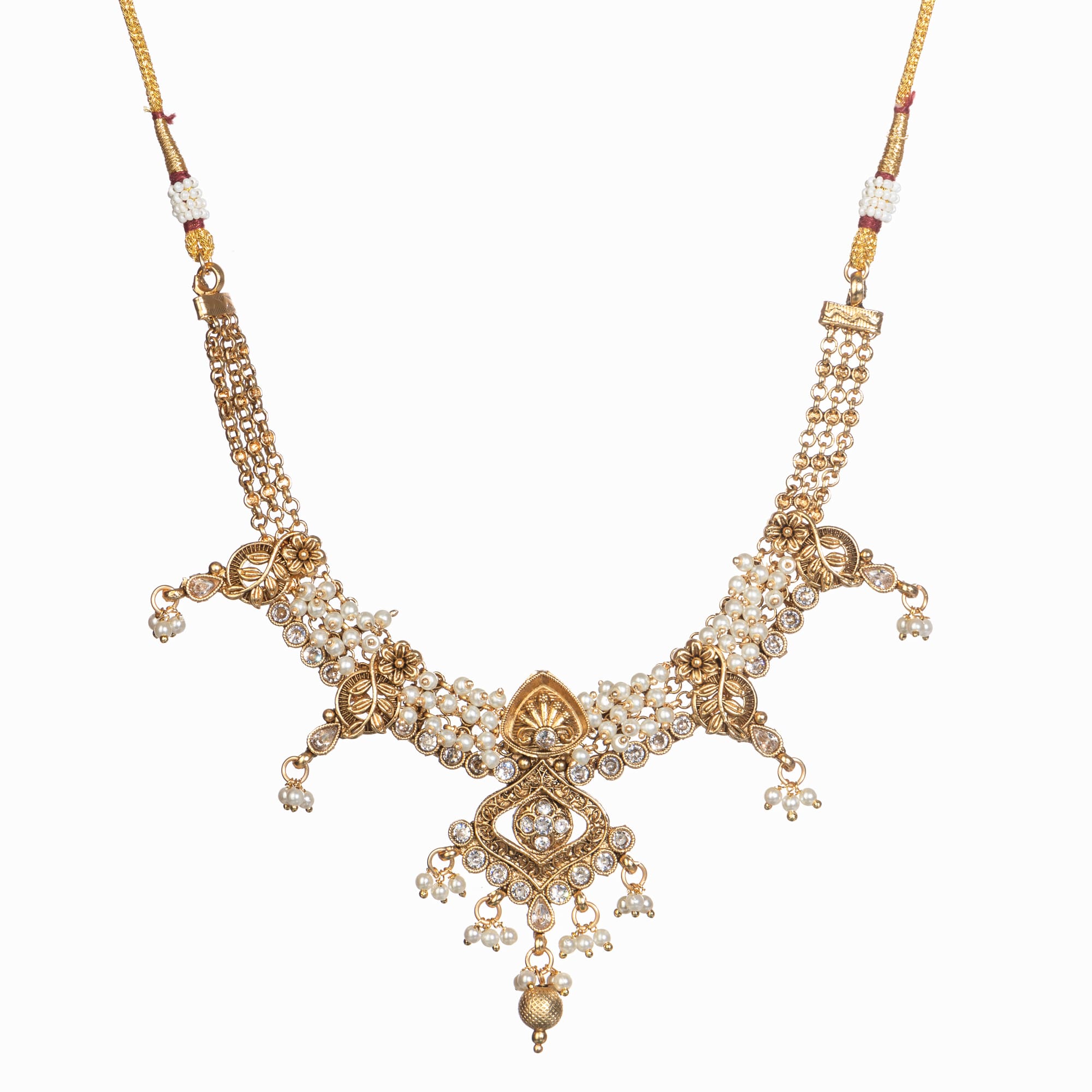 "Gold-tone necklace set with white pearls for a classic and elegant look."
