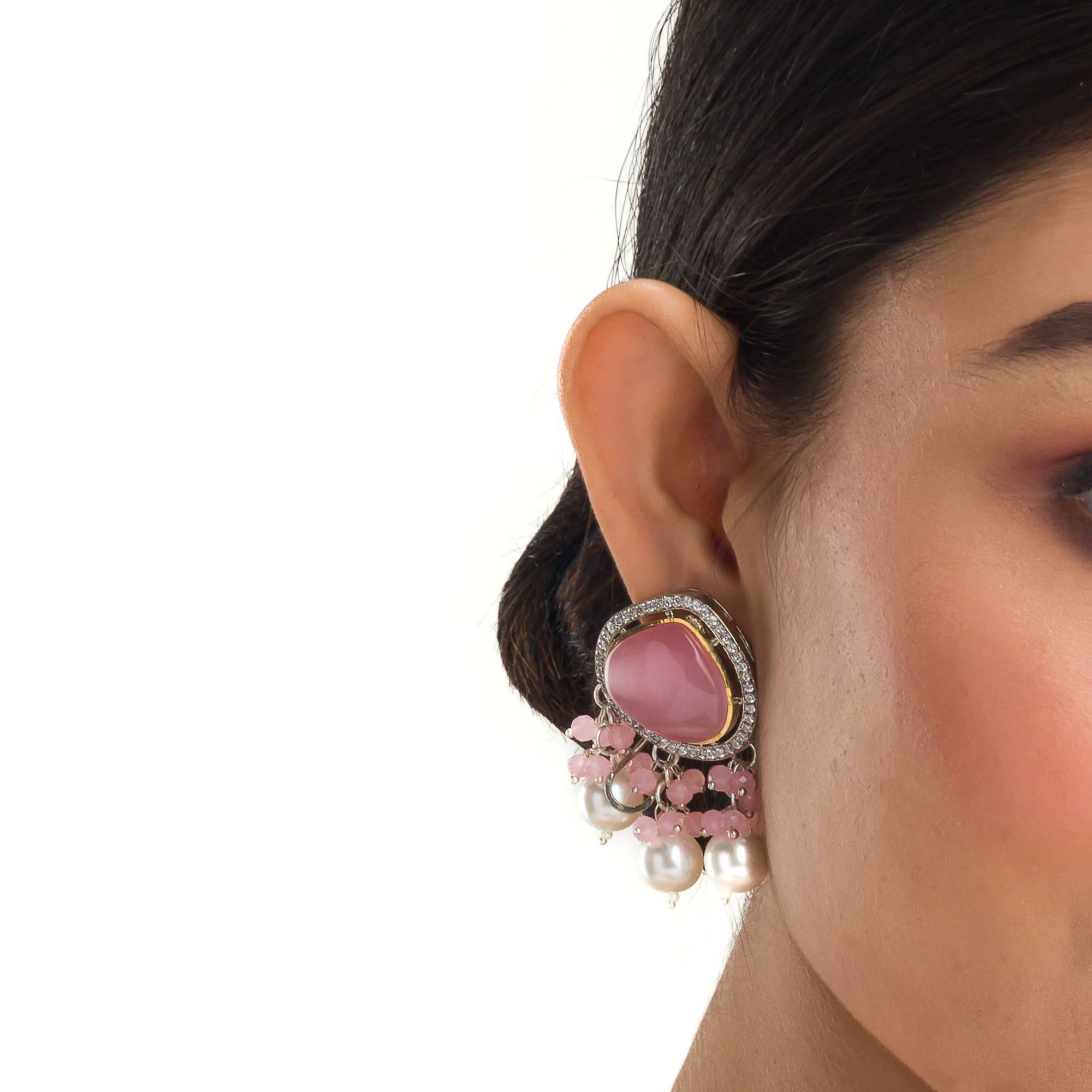 "Graceful pink pendant on a white pearl long necklace for a feminine touch."

