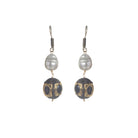 "Elegant white pearl long necklace with golden accents for a glamorous finish."
