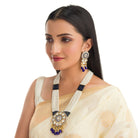 "Maharani long necklace with blue Kundan and white pearls for royal sophistication."

