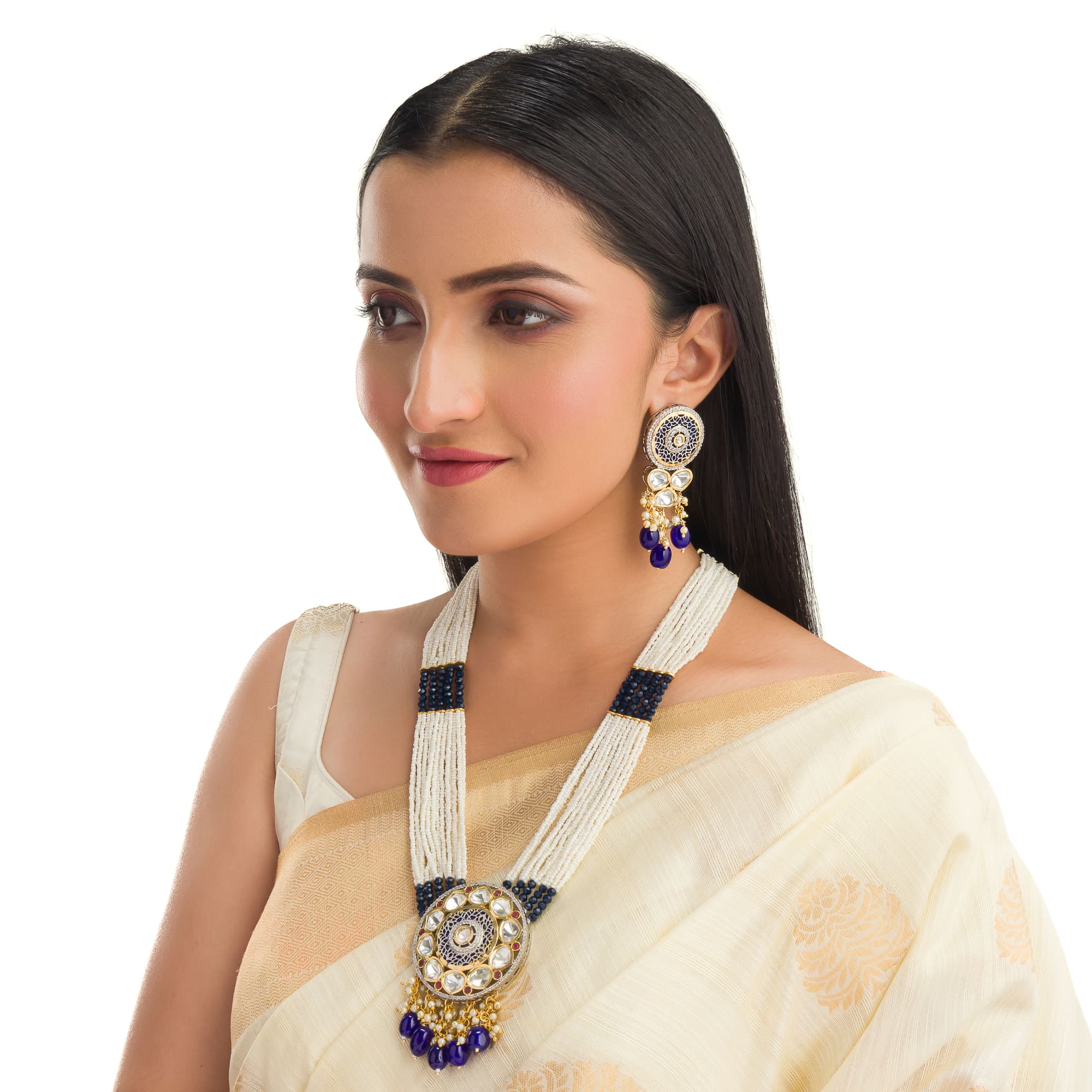 "Maharani long necklace with blue Kundan and white pearls for royal sophistication."
