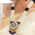 "Maharani long necklace with blue Kundan and white pearls for royal sophistication."
