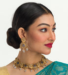 "Gold-tone necklace with grey stones and Kundan for a chic, modern appeal."
