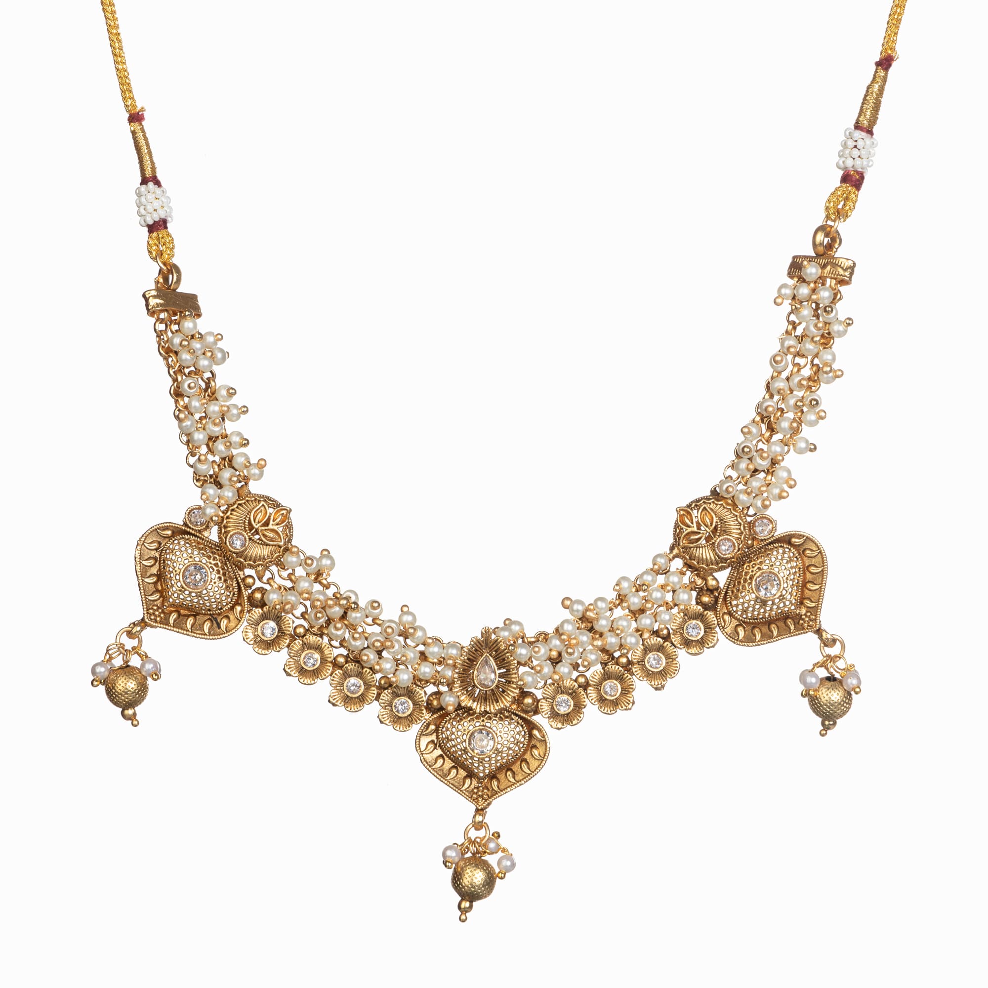 "Elegant goldtone necklace with lustrous pearls for timeless sophistication."
