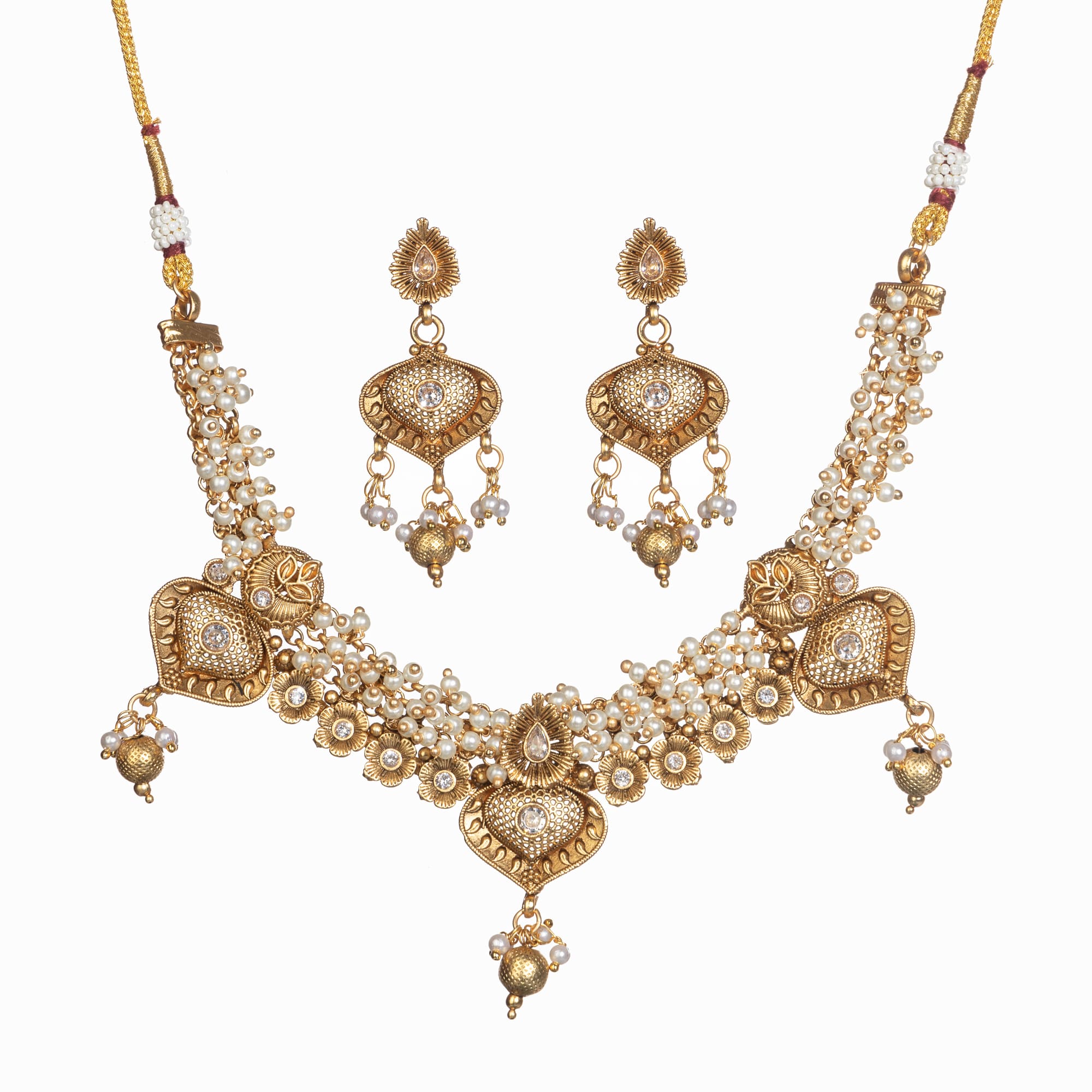 "Elegant goldtone necklace with lustrous pearls for timeless sophistication."
