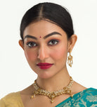 "Elegant goldtone necklace with lustrous pearls for timeless sophistication."
