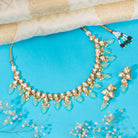 "Light green kundan necklace radiates vibrant, elegant charm."
