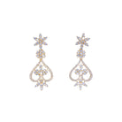 Small S-shaped zircon necklace with gold polish offers delicate elegance and subtle sparkle.
