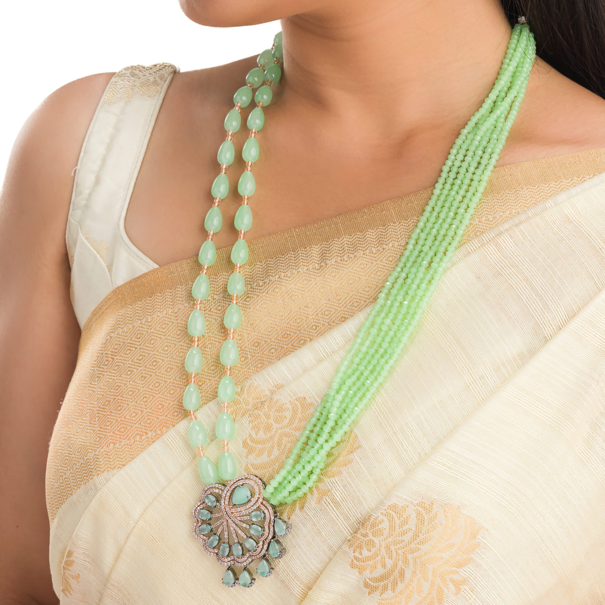 "Light green pearl long necklace in rose gold for a fresh, elegant look."
