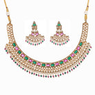 "Gold-tone necklace with multi-color stones adds vibrant style and festive charm."
