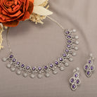 Violet zircon necklace adds a rich, sophisticated touch to festive looks.
