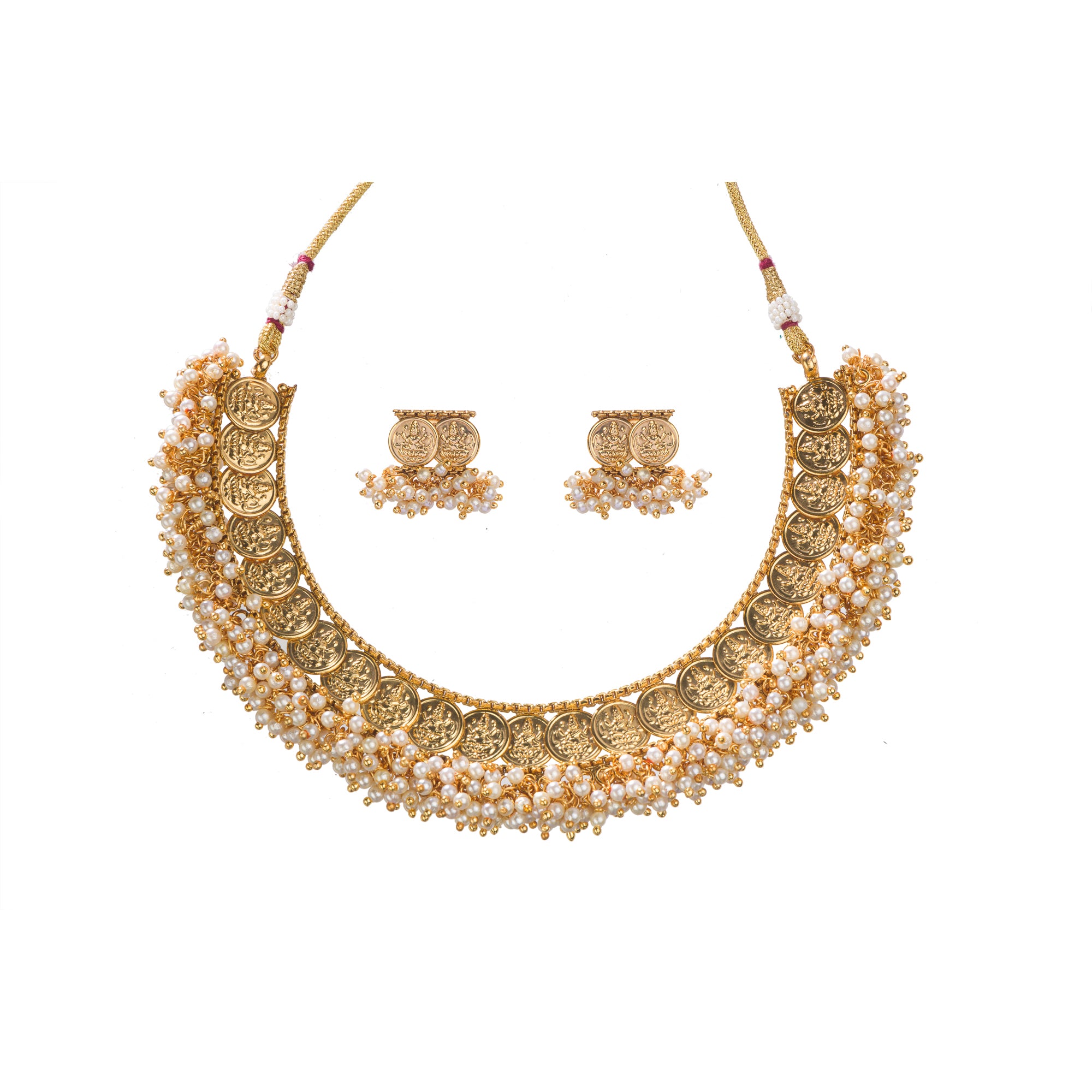 Gold-tone necklace with coin design and pearls exudes timeless elegance.
