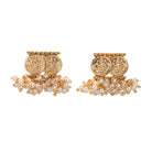 Gold-tone necklace with coin design and pearls exudes timeless elegance.
