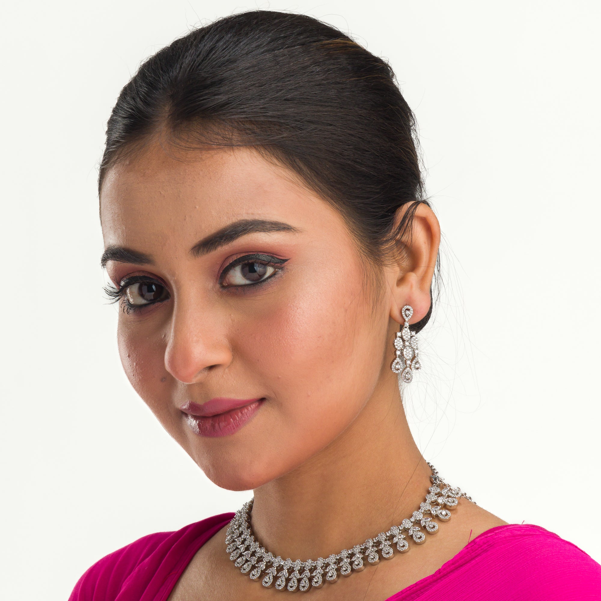 Elegant zircon necklace in silver polish offers rich, sophisticated charm.
