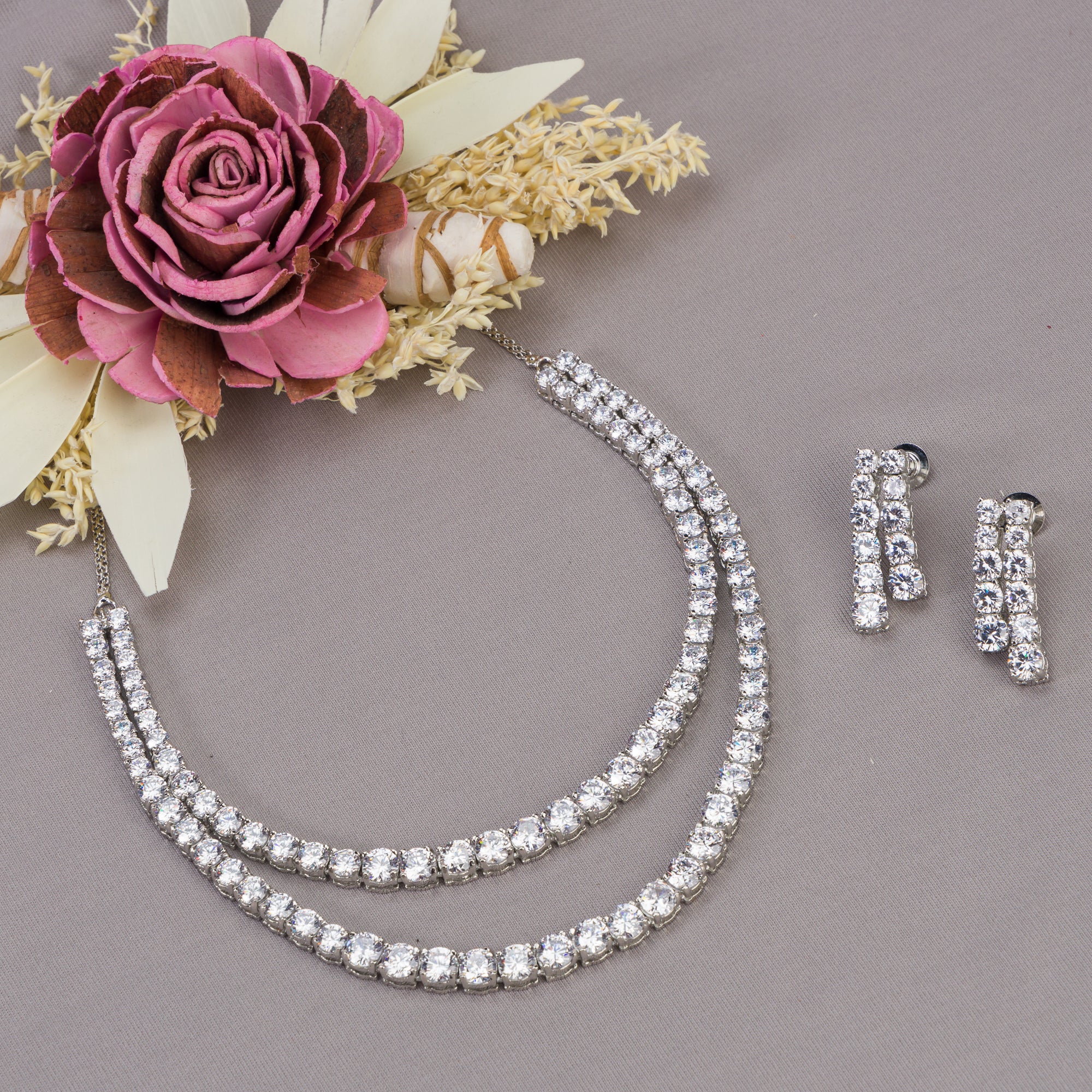 Double-layer zircon necklace adds brilliance and sophistication for a party look.
