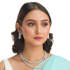 Double-layer zircon necklace adds brilliance and sophistication for a party look.
