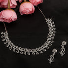 S-shaped zircon design offers sleek, flowing elegance for a refined style.
