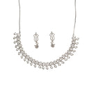 S-shaped zircon design offers sleek, flowing elegance for a refined style.
