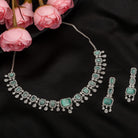 Light green zircon necklace adds a fresh, elegant touch to your festival style.
