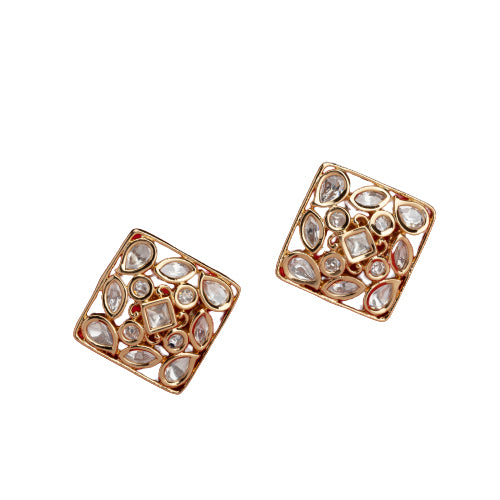 Gold-tone square stud earrings offer a sleek, modern look with a sophisticated shine.
