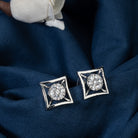 "Silver square zircon earrings bring modern sophistication and subtle sparkle for office wear."
