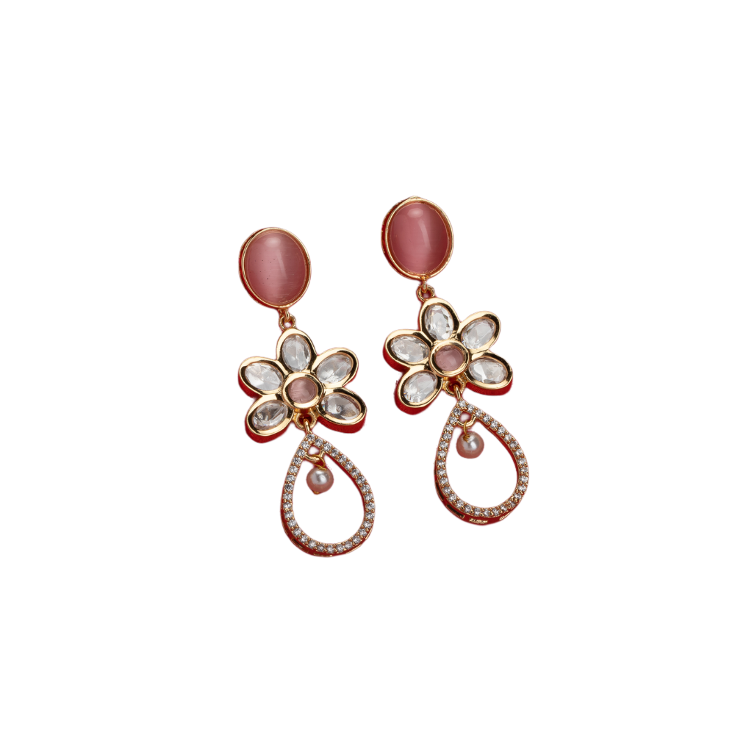 "Orchid gold-tone dangler earrings add a pop of color and refined shine for parties."
