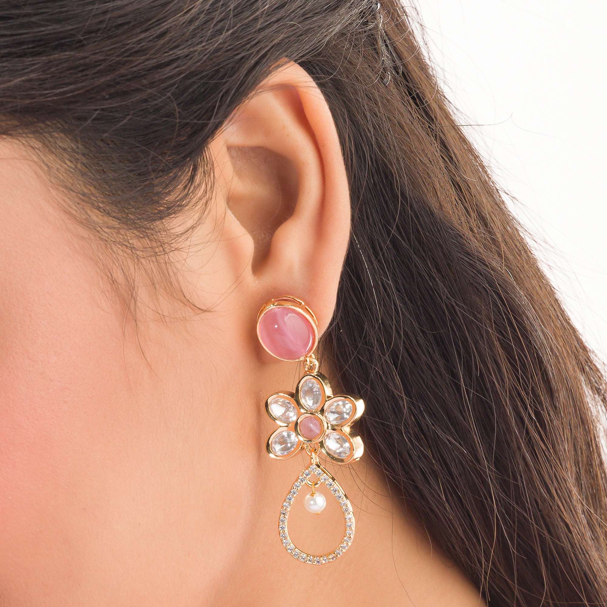 "Orchid gold-tone dangler earrings add a pop of color and refined shine for parties."
