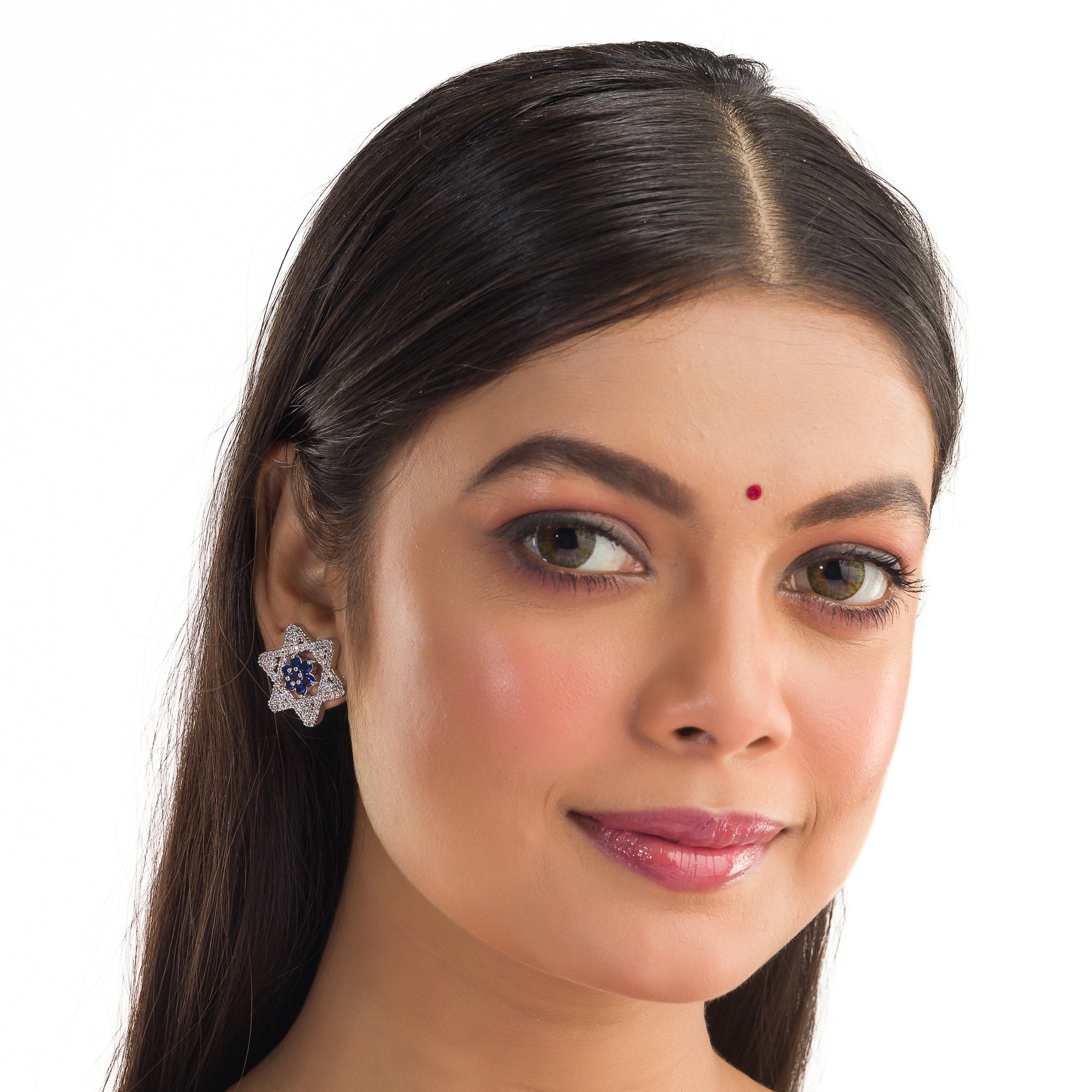 "Blue zircon stud earrings with a starry design add vibrant color and elegant sparkle to your style."
