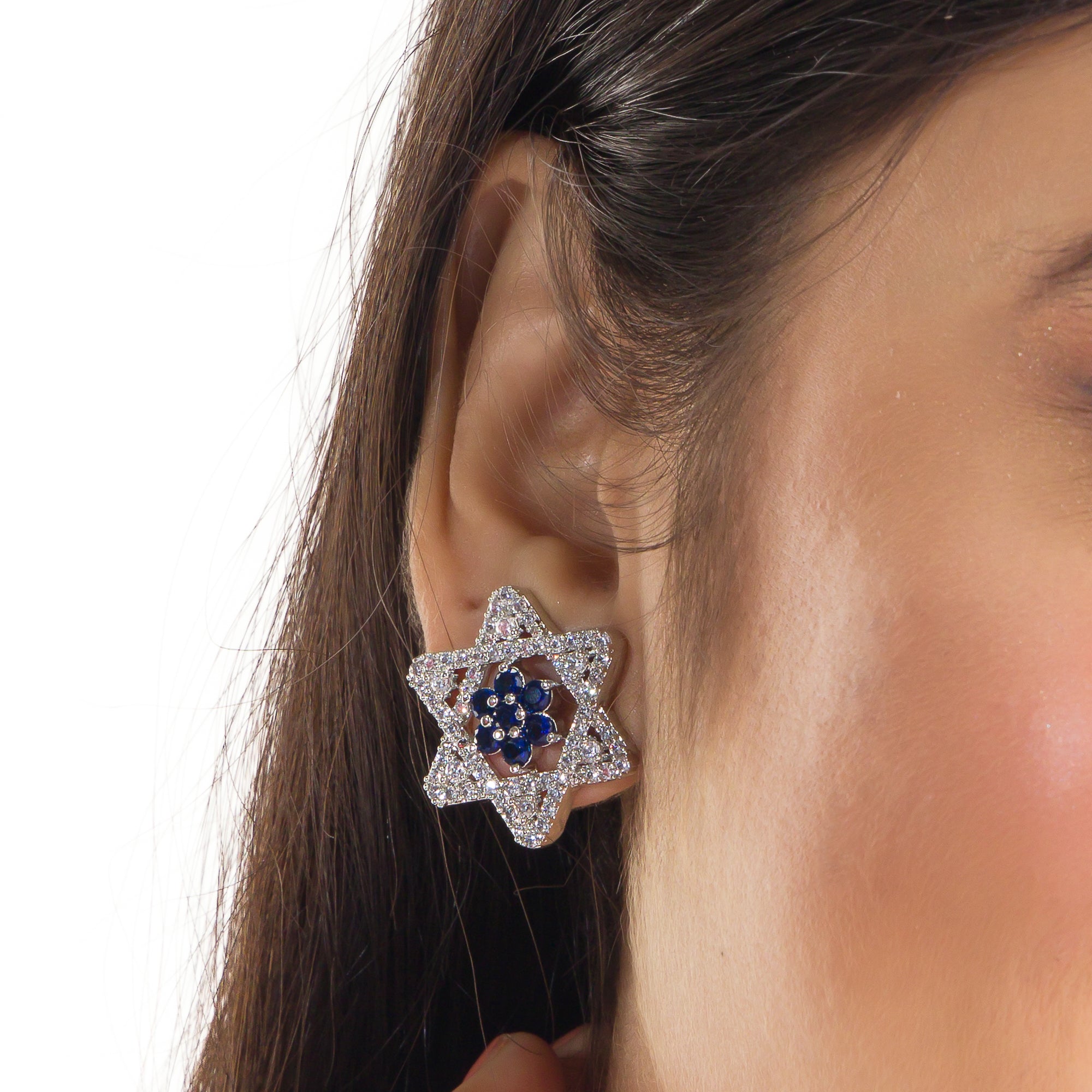 "Blue zircon stud earrings with a starry design add vibrant color and elegant sparkle to your style."
