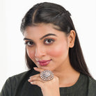 Black zircon-studded silver finger ring adds bold elegance with dazzling sparkle.
