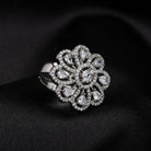Silver floral zircon finger ring combines timeless beauty with sparkling brilliance.
